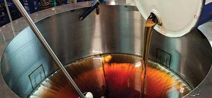 Lubricant being blended during oil production